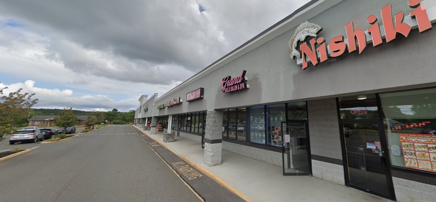 Grand Nails Salon & SPA storefront in the Columbia Turnpike shopping plaza