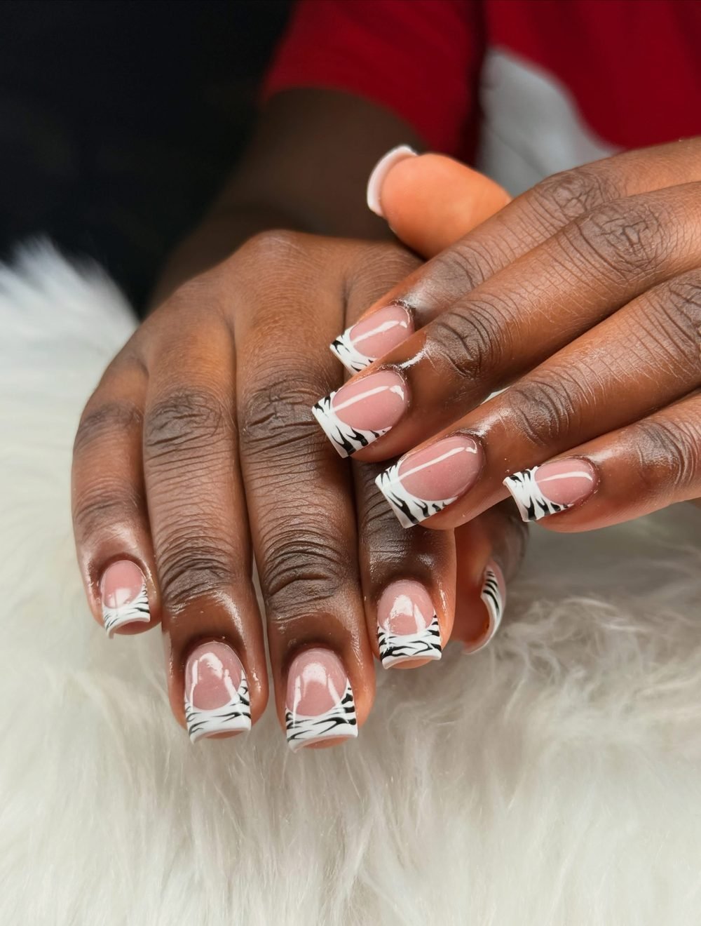 Zebra print French tip manicure